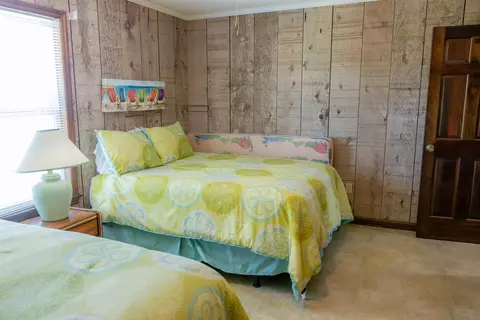 Bedroom - 1219 Alligator Dr, Alligator Point, FL 32346 photo 9 of 13