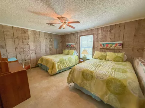Bedroom - 1219 Alligator Dr, Alligator Point, FL 32346 photo 1 of 13