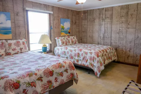 Bedroom - 1219 Alligator Dr, Alligator Point, FL 32346 photo 10 of 13