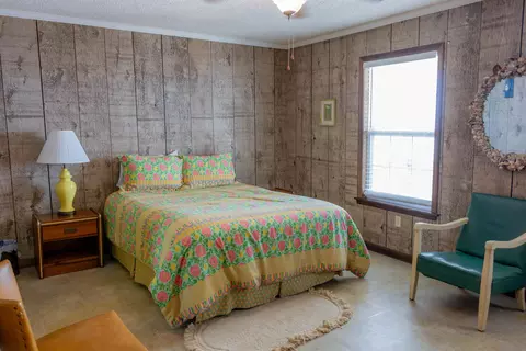 Bedroom - 1219 Alligator Dr, Alligator Point, FL 32346 photo 12 of 13