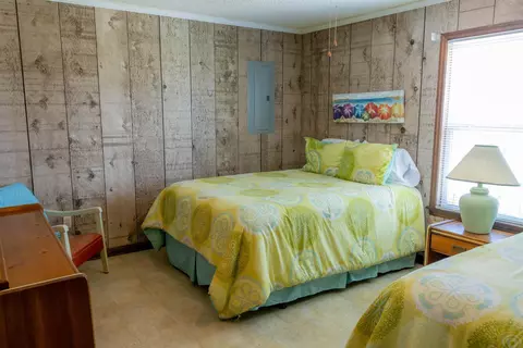 Bedroom - 1219 Alligator Dr, Alligator Point, FL 32346 photo 8 of 13
