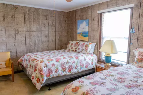 Bedroom - 1219 Alligator Dr, Alligator Point, FL 32346 photo 11 of 13