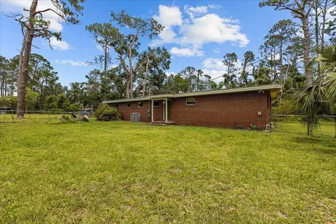 Exterior - 301 N Manila Ave, Perry, FL 32347 photo 5 of 14