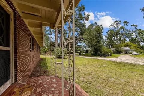 Exterior - 301 N Manila Ave, Perry, FL 32347 photo 3 of 14
