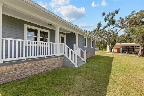 Exterior - 647 SE Regency Trl, Madison, FL 32340 photo 3 of 13