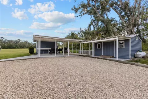 Exterior - 647 SE Regency Trl, Madison, FL 32340 photo 12 of 13