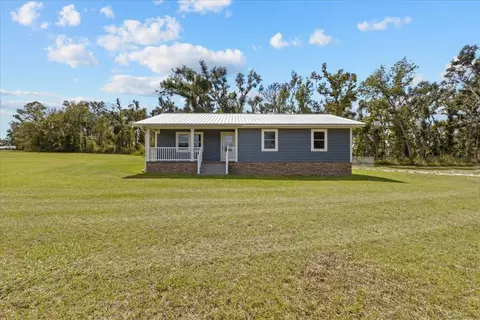 Exterior - 647 SE Regency Trl, Madison, FL 32340 photo 1 of 13