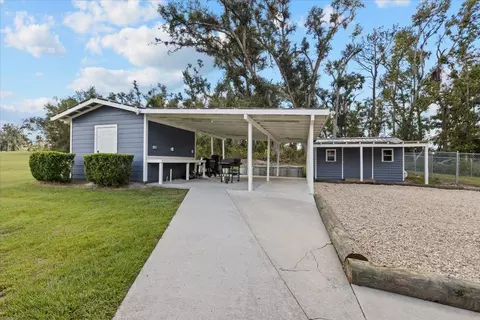 Exterior - 647 SE Regency Trl, Madison, FL 32340 photo 11 of 13