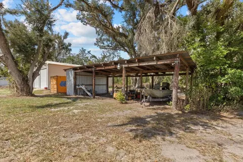 Exterior - 647 SE Regency Trl, Madison, FL 32340 photo 8 of 13