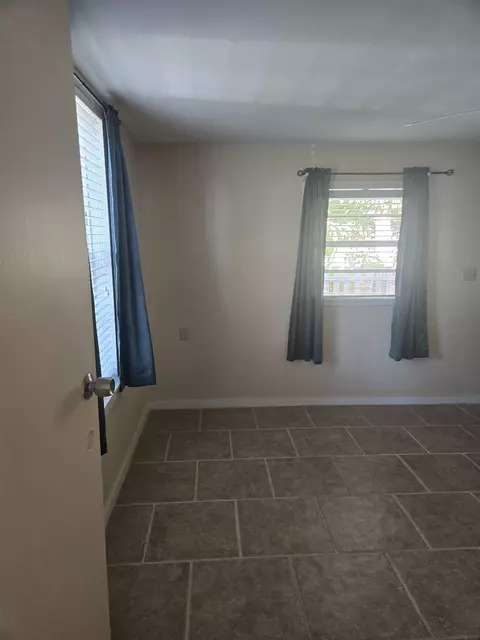 Bedroom - 51 E Pine St # -1, Carrabelle, FL 32322 photo 2 of 9