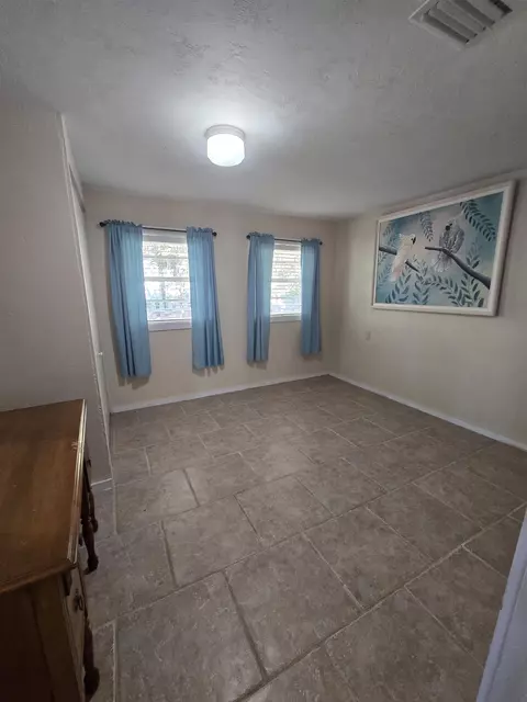 Bedroom - 51 E Pine St # -1, Carrabelle, FL 32322 photo 6 of 9