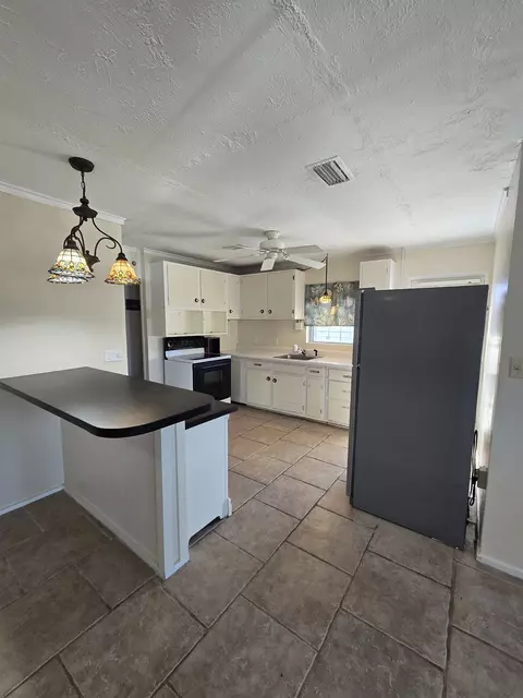 Kitchen - 51 E Pine St # -1, Carrabelle, FL 32322 photo 2 of 8