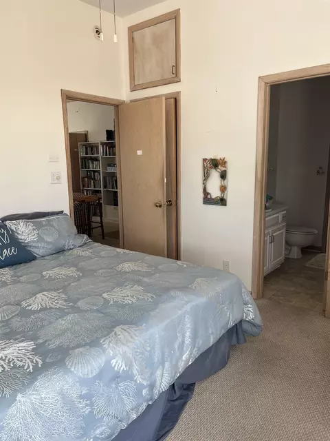 Bedroom - 604 Bald Point Dr, Alligator Point, FL 32346 photo 1 of 5