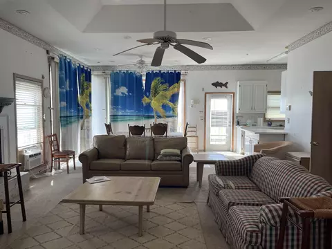 Living - 604 Bald Point Dr, Alligator Point, FL 32346 photo 4 of 7