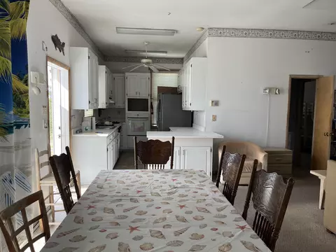 Dining - 604 Bald Point Dr, Alligator Point, FL 32346 photo 2 of 3
