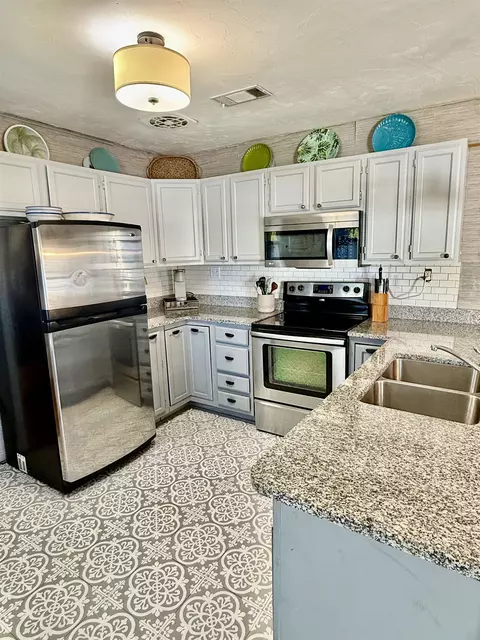 Kitchen - 2521 Florida Ave, Lanark Village, FL 32323 photo 3 of 3