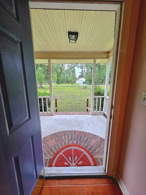Exterior - 210 Worley Way, Perry, FL 32347 photo 5 of 16
