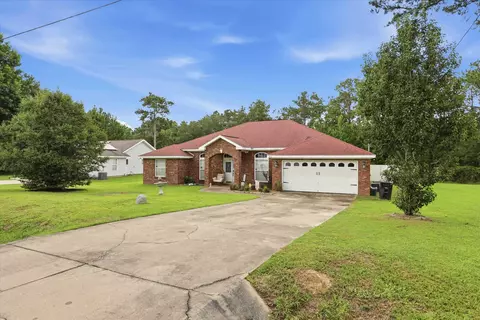 Exterior - 496 Rustling Pines Blvd, Midway, FL 32343 photo 2 of 8