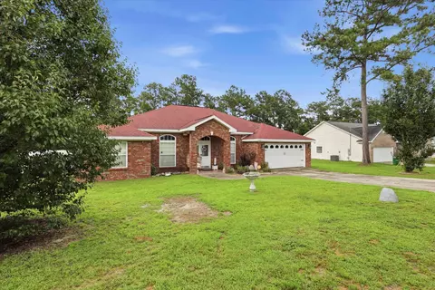 Exterior - 496 Rustling Pines Blvd, Midway, FL 32343 photo 3 of 8