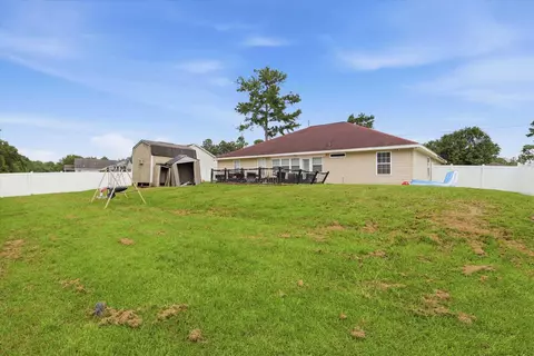 Exterior - 496 Rustling Pines Blvd, Midway, FL 32343 photo 8 of 8