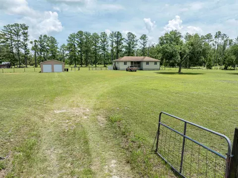 Exterior - 405 SE Apache Ave, Lee, FL 32059 photo 2 of 12