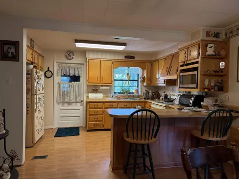Kitchen - 490 Roberts Aman Rd E, Perry, FL 32347 photo 3 of 3