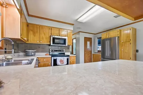 Kitchen - 803 Puckett Rd, Perry, FL 32348 photo 3 of 4