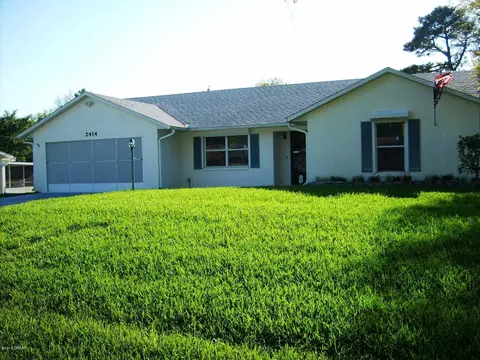 2414 Pine Tree Dr, Edgewater, FL 32141 photo 1