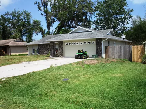 2525 Pine Tree Dr, Edgewater, FL 32141 photo 1