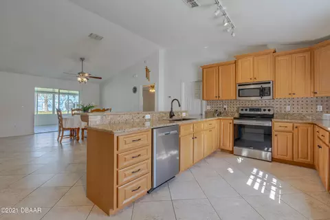 3034 Pine Tree Dr, Edgewater, FL 32141 photo 9