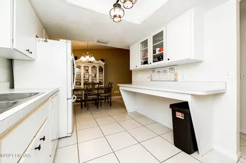 3111 Queen Palm Dr, Edgewater, FL 32141 photo 4