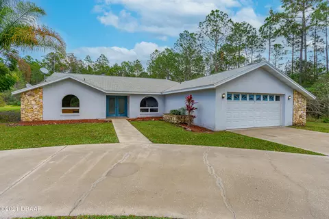 261 E Woodhaven Cir, Ormond Beach, FL 32174 photo 1
