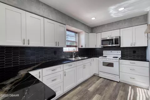 Kitchen - 64 Berkley Rd, Ormond Beach, FL 32176 photo 3 of 4