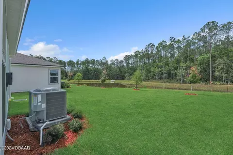Exterior - 51 Bogey Pl, Bunnell, FL 32110 photo 2 of 9