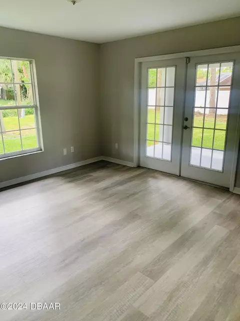Living - 1828 Pine Tree Dr, Edgewater, FL 32132 photo 2 of 2