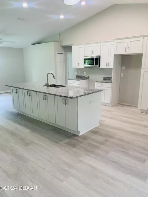 Kitchen - 1828 Pine Tree Dr, Edgewater, FL 32132 photo 2 of 2