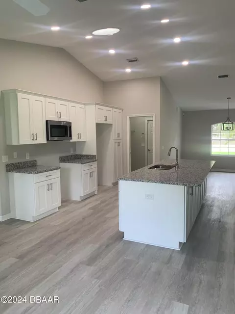 Kitchen - 1828 Pine Tree Dr, Edgewater, FL 32132 photo 1 of 2