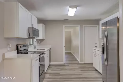 Kitchen - 2718 Unity Tree Dr, Edgewater, FL 32141 photo 2 of 2