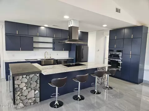 Kitchen - 1327 Oak Forest Dr, Ormond Beach, FL 32174 photo 8 of 11