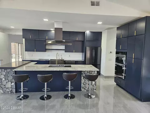Kitchen - 1327 Oak Forest Dr, Ormond Beach, FL 32174 photo 11 of 11