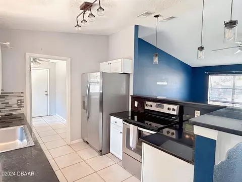 Kitchen - 2721 Tamarind Dr, Edgewater, FL 32141 photo 2 of 2