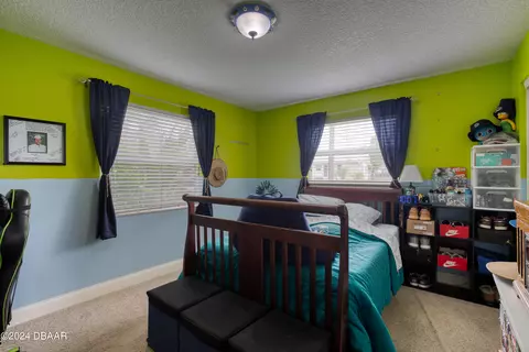 Bedroom - 65 Sunny Shore Dr, Ormond Beach, FL 32176 photo 4 of 7