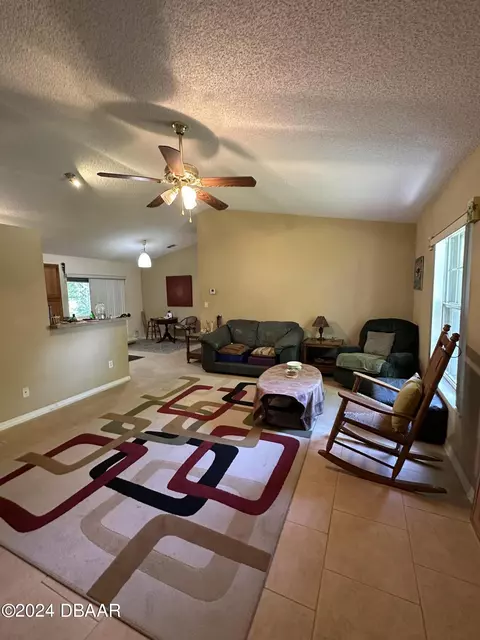 Living - 2521 Mango Tree Dr, Edgewater, FL 32141 photo 1 of 1