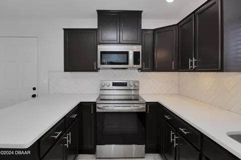 Kitchen - 13 Sea Hawk Dr, Ormond Beach, FL 32176 photo 5 of 5