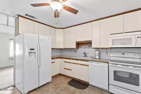Kitchen - 2620 Orange Tree Dr, Edgewater, FL 32141 photo 2 of 3