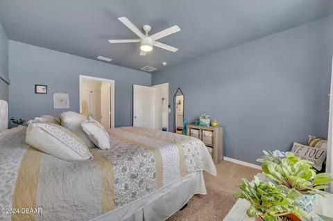 Bedroom - 136 Old Mill Pond Rd, Edgewater, FL 32141 photo 2 of 3