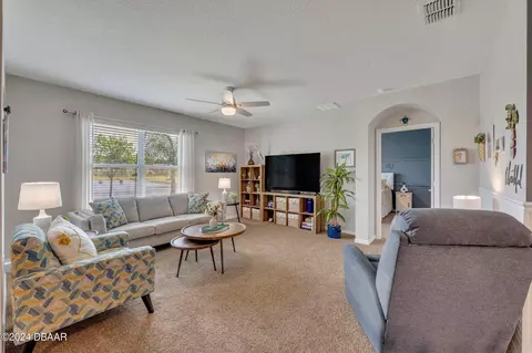 Living - 136 Old Mill Pond Rd, Edgewater, FL 32141 photo 1 of 4