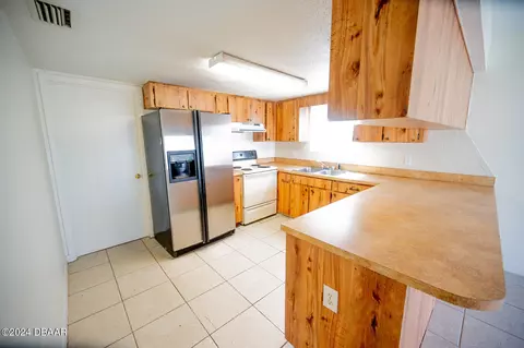 Kitchen - 15271529 Juniper Dr, Edgewater, FL 32132 photo 3 of 4