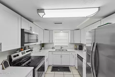 Kitchen - 3129 Queen Palm Dr, Edgewater, FL 32141 photo 2 of 2