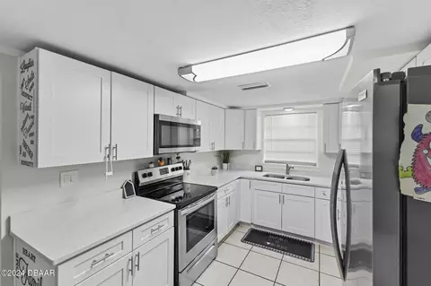 Kitchen - 3129 Queen Palm Dr, Edgewater, FL 32141 photo 1 of 2